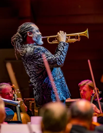Herb Smith playing the trumpet with the No Name Pops